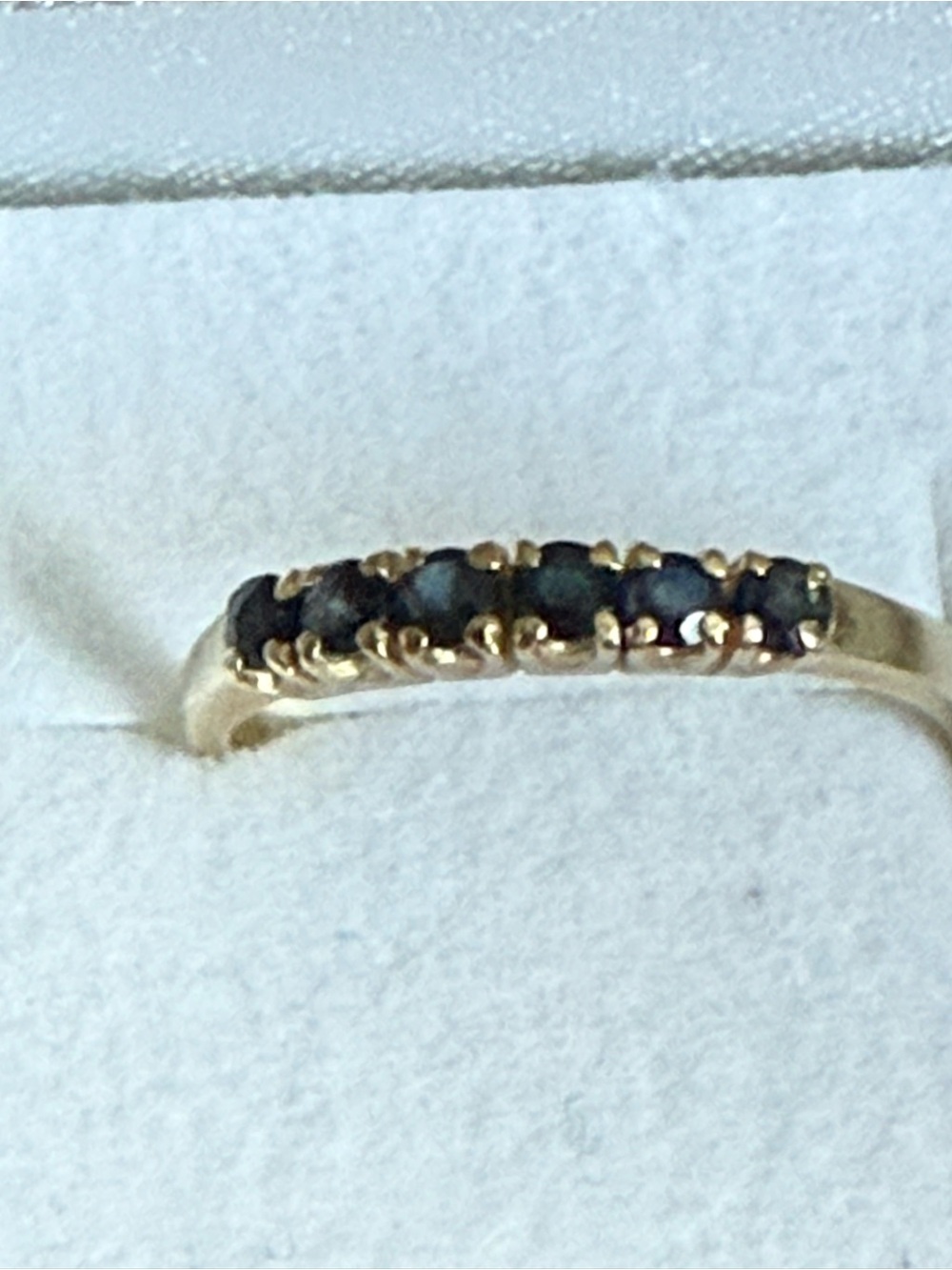 Gold Ring with Deep Blue Sapphire Row